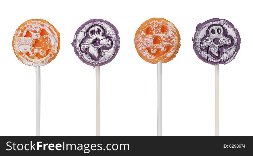 Four halloween suckers isolated on a white background