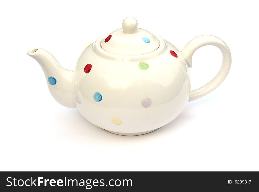 Shot of a spotty teapot on white