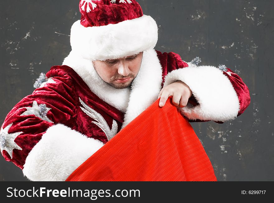 Santa Claus is preparing to celebrate Christmas. With red bag. Santa Claus is preparing to celebrate Christmas. With red bag
