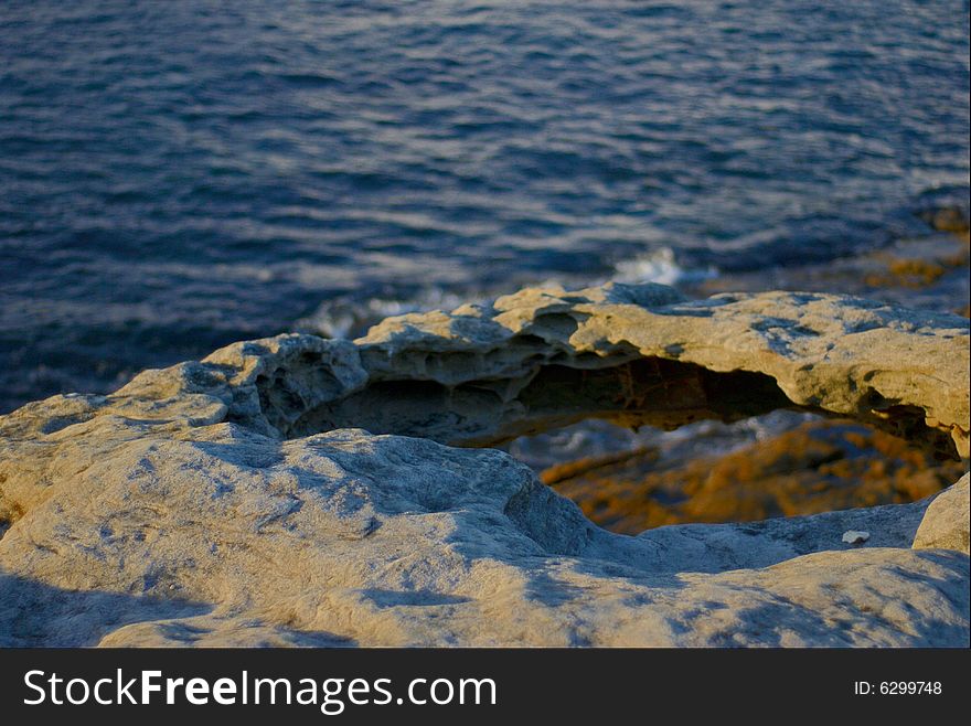 The rocks on top of the sea