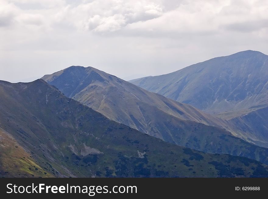 A view of Polish Tatra mountains on an overcast day