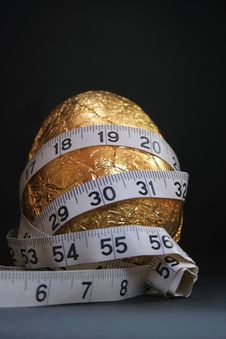 1 Easter Egg, Diets And Tape Measure 2 Royalty Free Stock Images