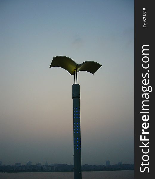 Aritistic lamppost at dusk sky