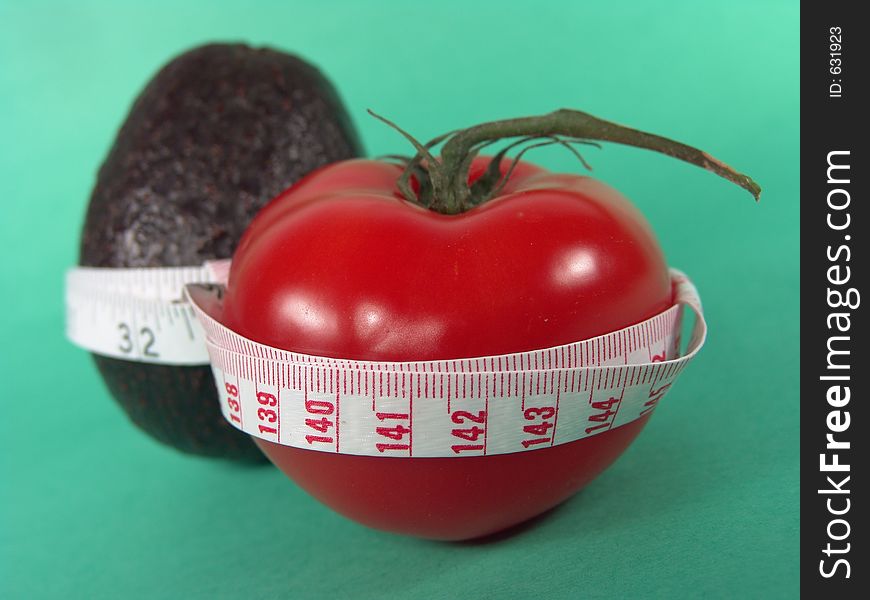 High resolution digital photo of an avocado, a tomato and a measuring tape symbolize healthy diet, cancer/disease prevention and body weight control. It is a Ã¢â‚¬Å“PRESCRIPTIONS FOR HEALTHÃ¢â‚¬Â!. High resolution digital photo of an avocado, a tomato and a measuring tape symbolize healthy diet, cancer/disease prevention and body weight control. It is a Ã¢â‚¬Å“PRESCRIPTIONS FOR HEALTHÃ¢â‚¬Â!