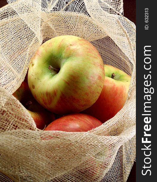 Apples in natural woven basket. Apples in natural woven basket.