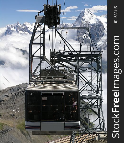 Cable car arriving at the top of the Alps