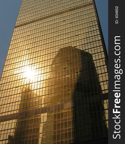 Modern building in copper reflective glass. Modern building in copper reflective glass
