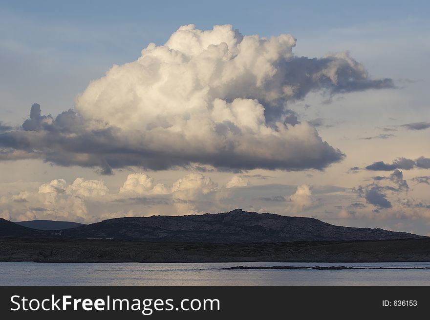 Big cloud on Isola Piana, Stintino, Sardinia, Italy