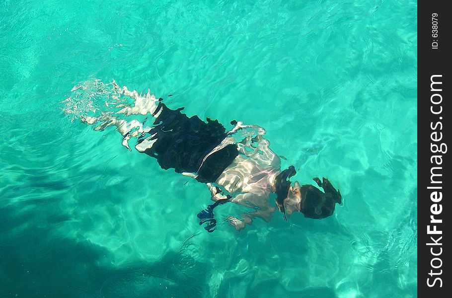 Distorted image of a man snorkeling