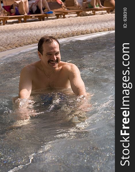 Man in jacuzzi. Man in jacuzzi