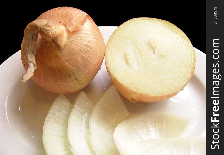 High resolution digital photo of onions on a porcelain plate