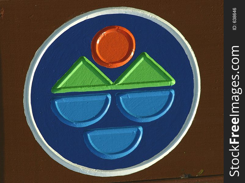 Park sign depicting sun, earth and water reference. Park sign depicting sun, earth and water reference