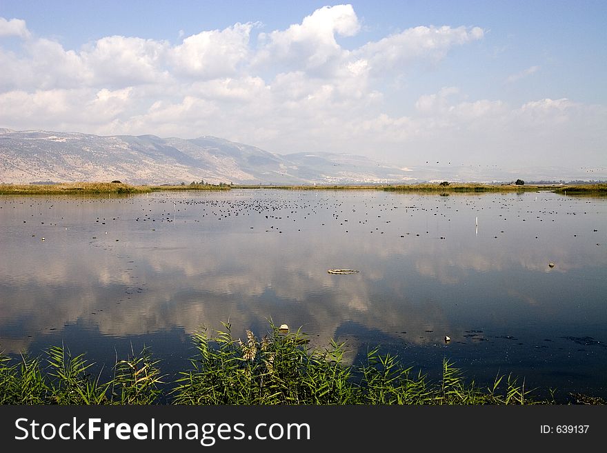 Mountain reflection in the water of the lake