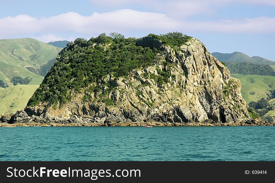 Lonely island near some beautiful landscapes.