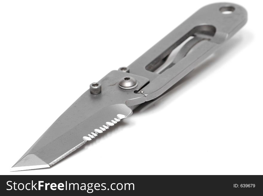 A Folding Metal Pocket Knife Isolated on a White Background. A Folding Metal Pocket Knife Isolated on a White Background