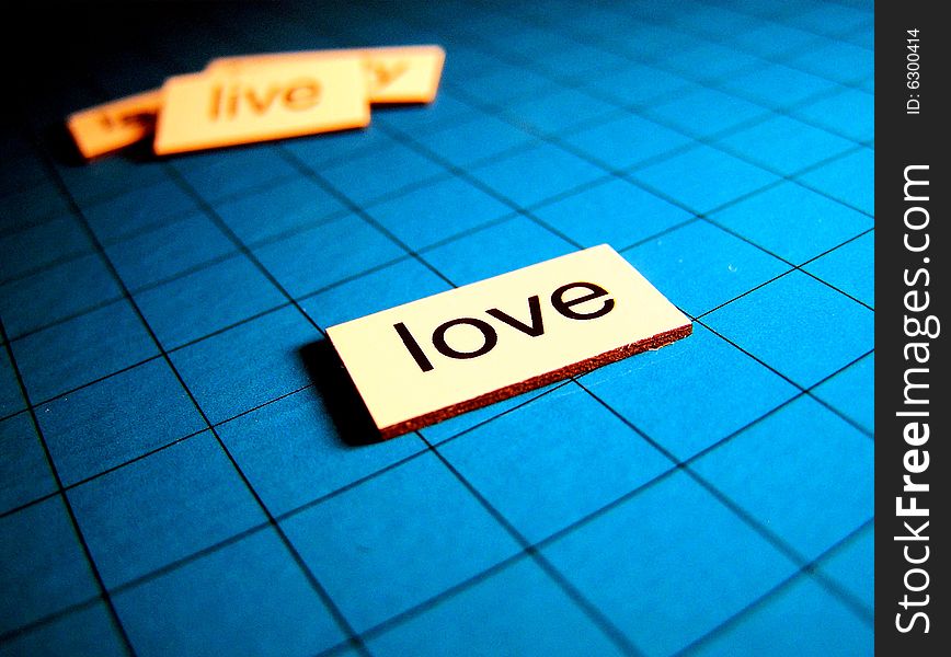 The word love on a blue background.