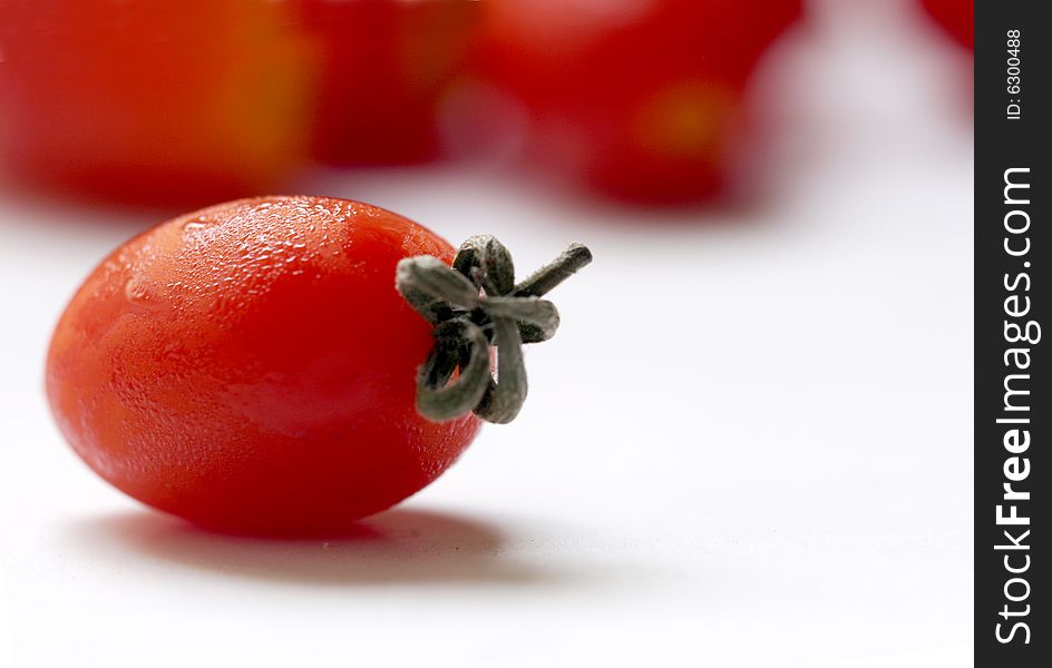 Mini cherry tomato isolated on white. Mini cherry tomato isolated on white