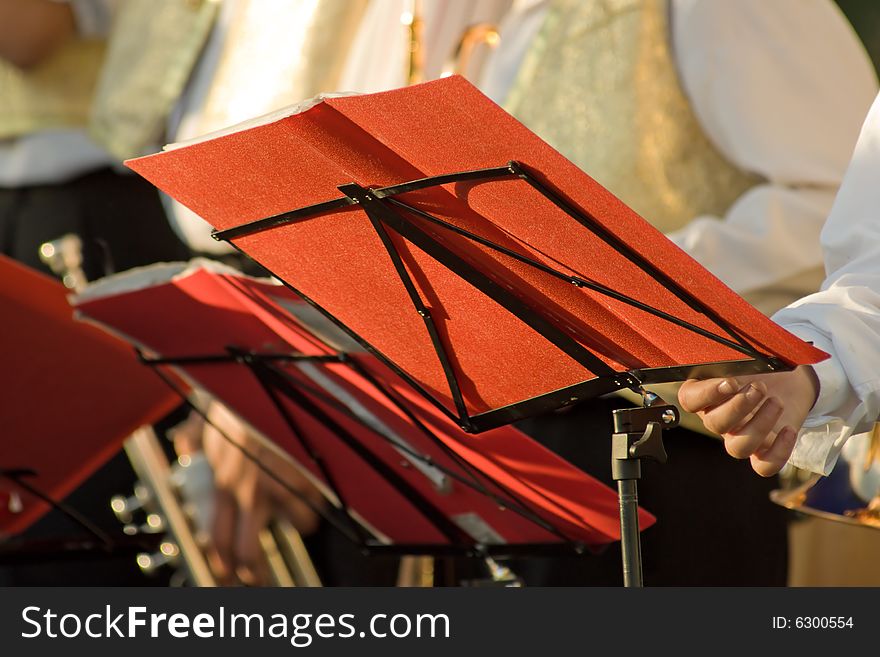 Young musicians are playing on trombones. Young musicians are playing on trombones