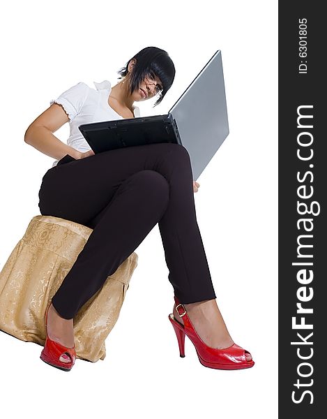 The student, a different angle view, with books, a pointer, the laptop, in points, standing and sitting, isolated on white. The student, a different angle view, with books, a pointer, the laptop, in points, standing and sitting, isolated on white