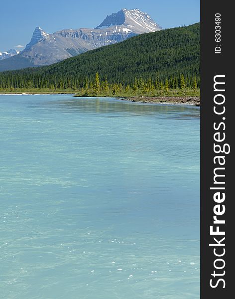 Summer beautiful lake view with mountain in Canadian Rockies. Summer beautiful lake view with mountain in Canadian Rockies