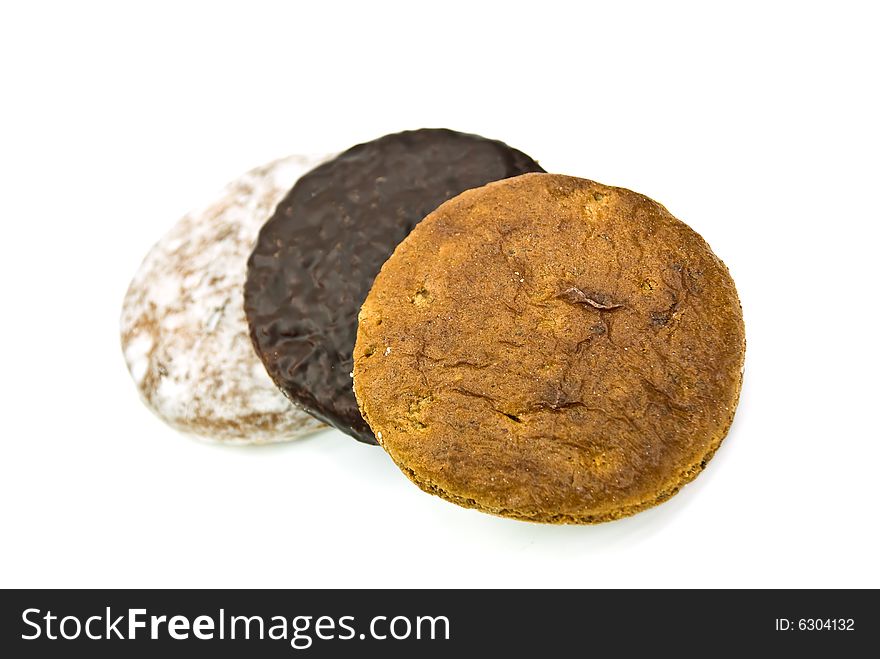 Colorful ginger breads on the white background - isolated.