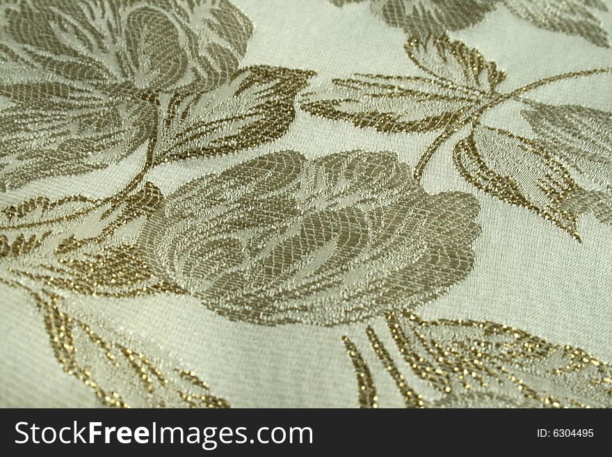 Material with golden thread, background