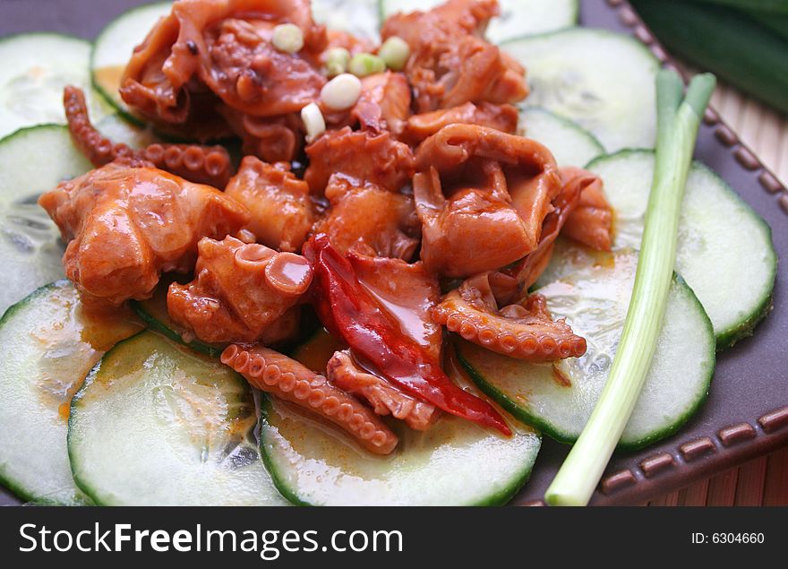 A fresh salad of octopus and cucumbers