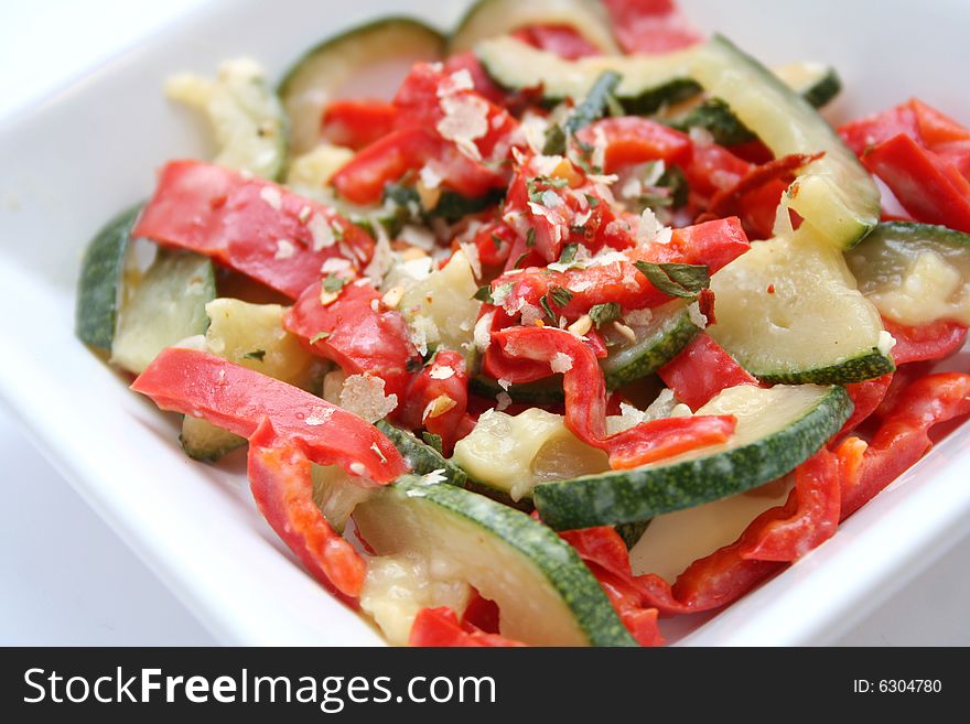 A italian antipasti of paprikas and zucchini with tofu