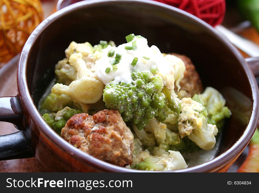 A stew of romanesque and meatballs