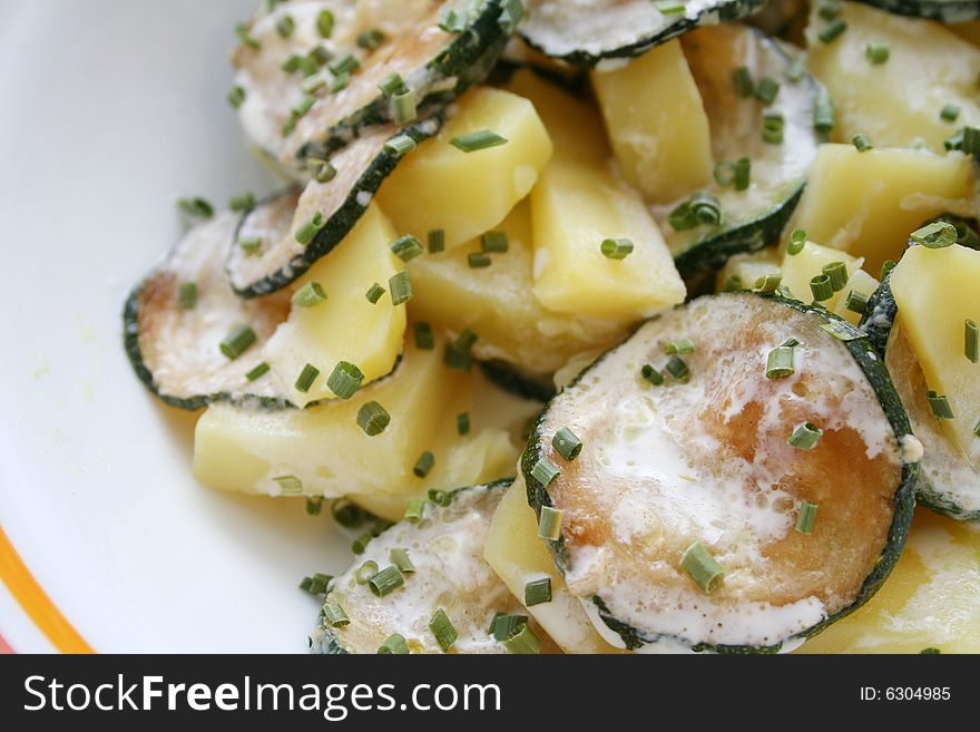 A meal of fresh zucchinis and potatoes. A meal of fresh zucchinis and potatoes