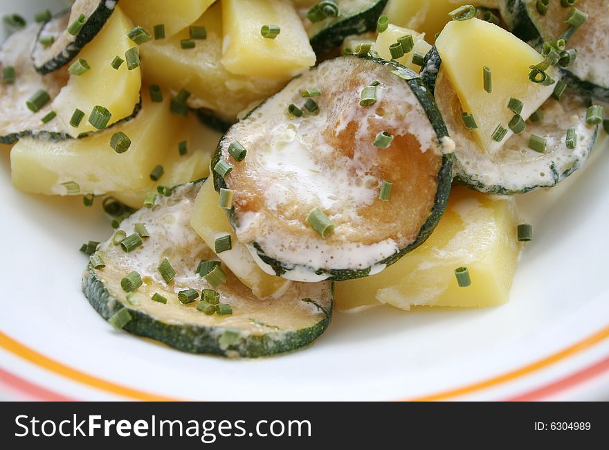 A meal of fresh zucchinis and potatoes. A meal of fresh zucchinis and potatoes