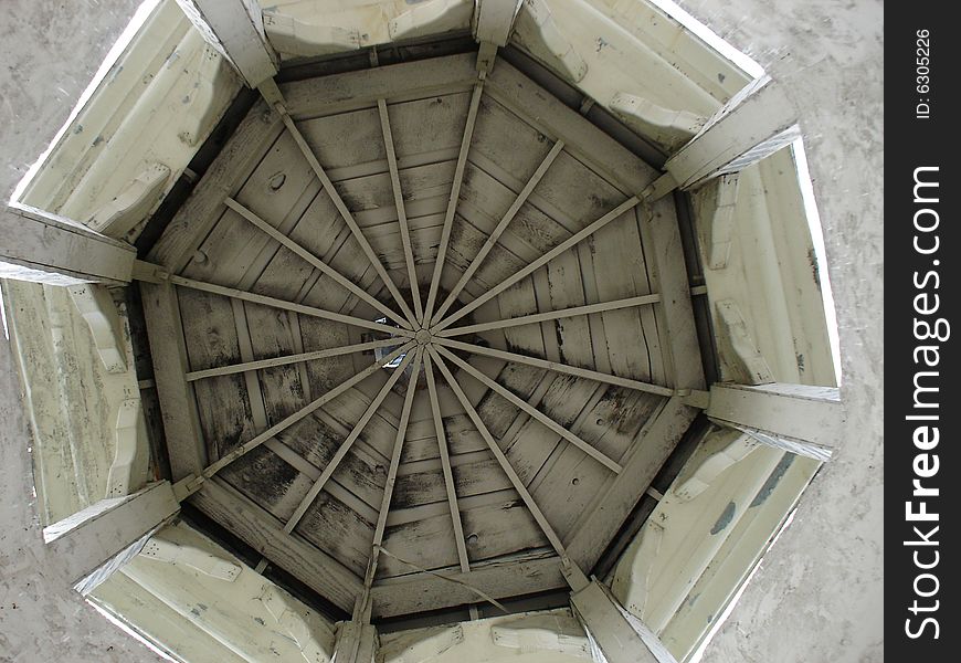 Looking upward in an old tower. Great detail in the center of the roof and the joints. Looking upward in an old tower. Great detail in the center of the roof and the joints.