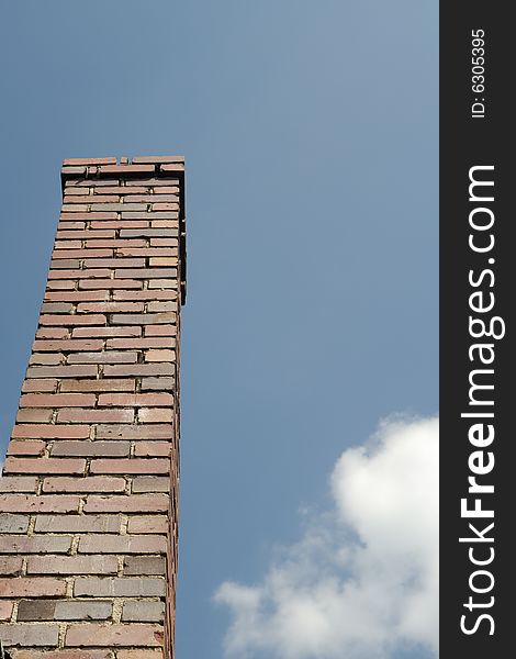Old red brick chimney with sky and clouds. Old red brick chimney with sky and clouds