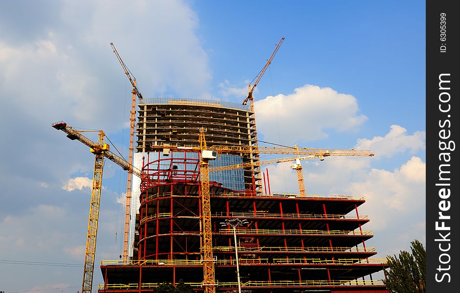 Crane and skyscraper building under construction
