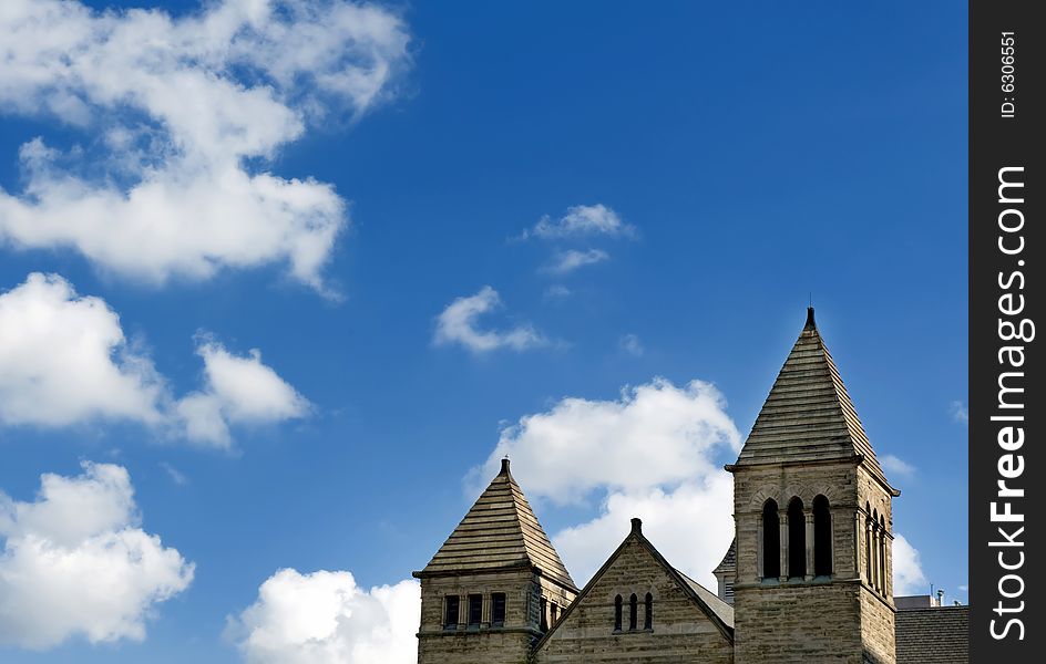 Top of a church on a bright blue sky