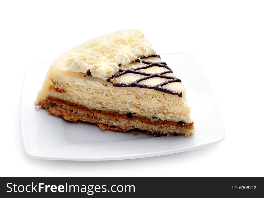 Cheesecake on a Plate. Isolated on White Background. Cheesecake on a Plate. Isolated on White Background