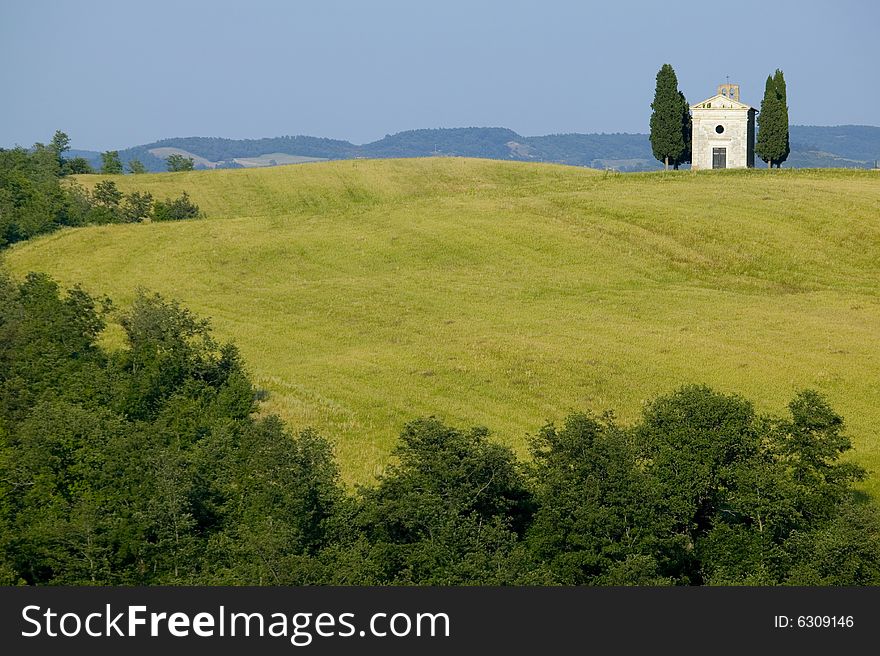 TUSCANY countryside with cypress and farm