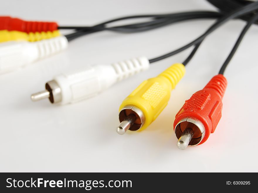 Tv-cables of yellow, white and red colors.