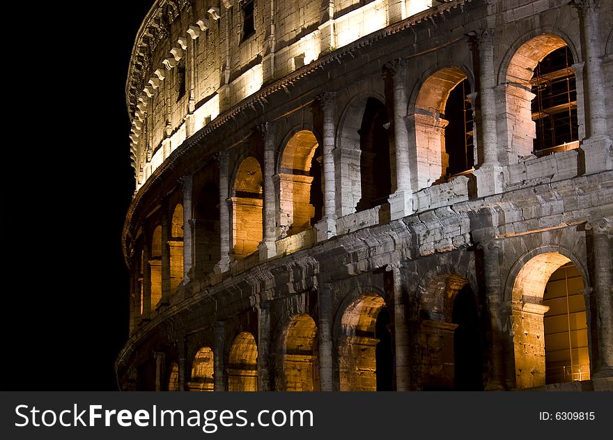 Illumination of the night Coliseum. Rome. Italy.