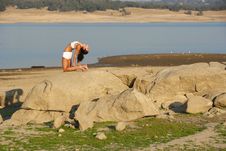 A Young Woman On Top Of A Rock Doing Yoga Stock Photography A Young Woman On Top Of A Rock Doing Yoga Stock Photography