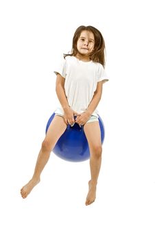 Young Girl On A Space Hopper Royalty Free Stock Photography Young Girl On A Space Hopper Royalty Free Stock Photography