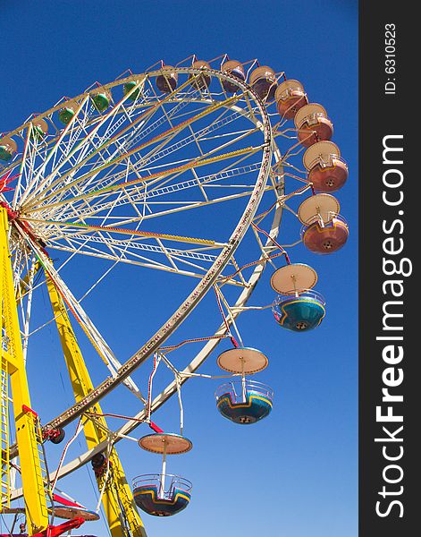 Observation wheel  under blue skies