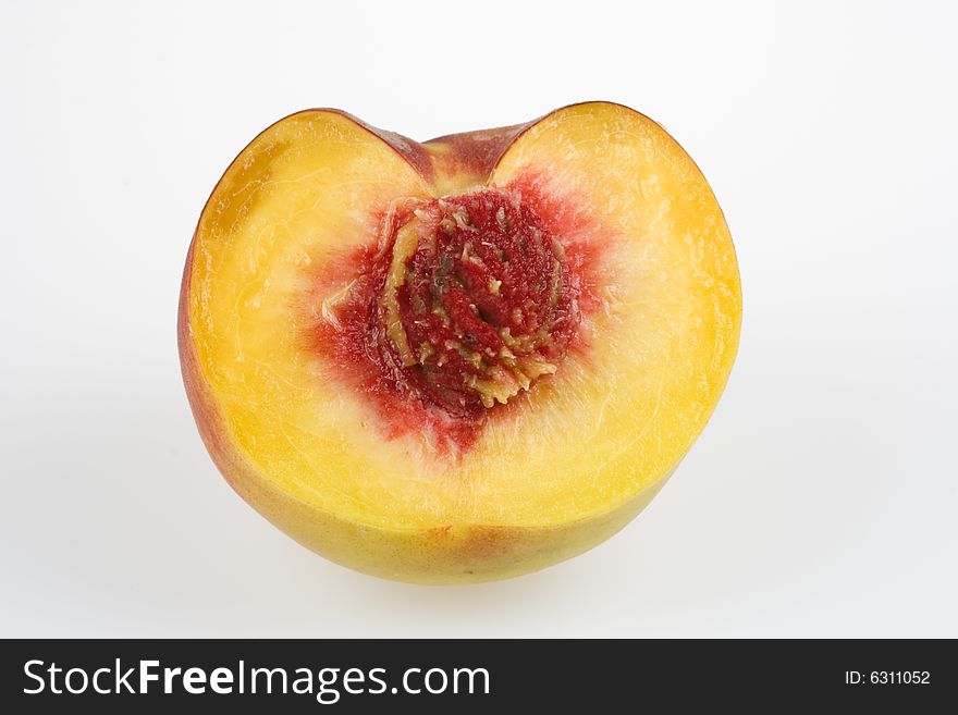 Half ripe peaches with stone