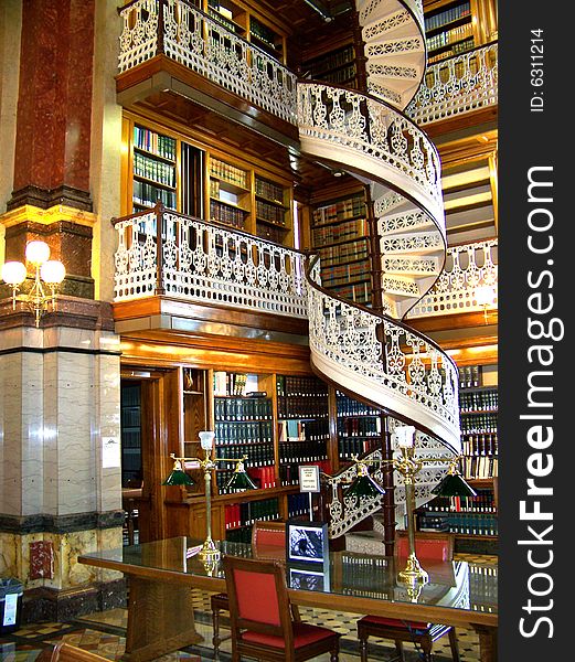 Interior of Capitol's library with books shelfs, tables and chairs