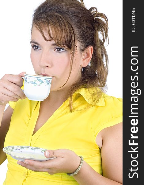 The portrait of girl with a mug of coffee isolated on white background