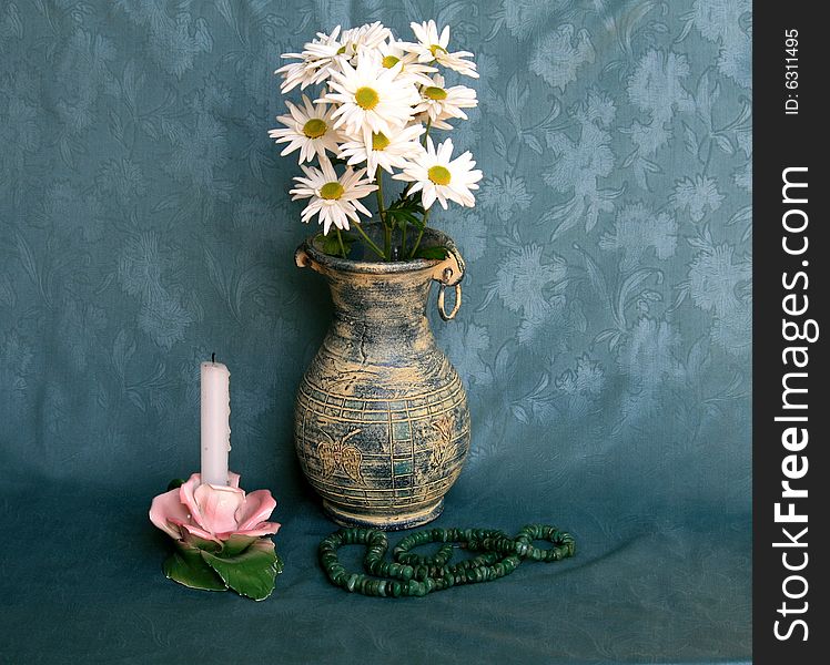 Vase with Daisies, Candlestick and Necklace as Still Life. Vase with Daisies, Candlestick and Necklace as Still Life