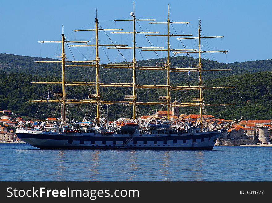 Caravel On A Background Of The Ancient City