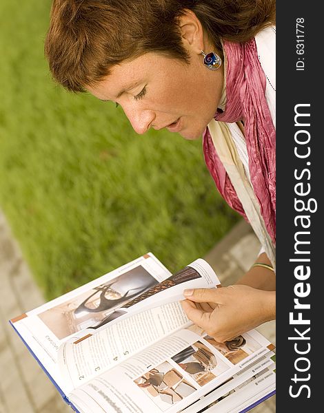 Woman Reading In The Park