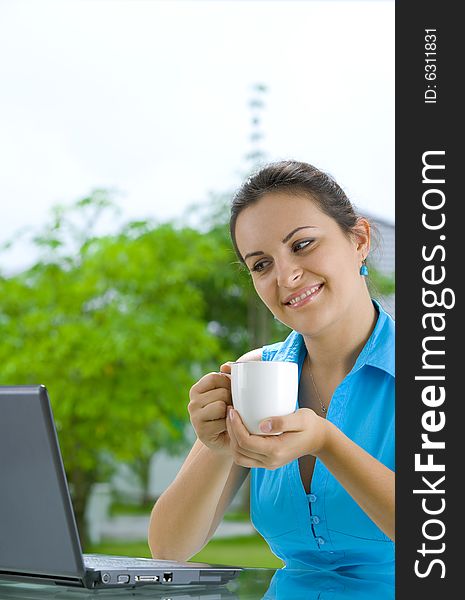 Portrait of young beautiful woman with her laptop. Portrait of young beautiful woman with her laptop