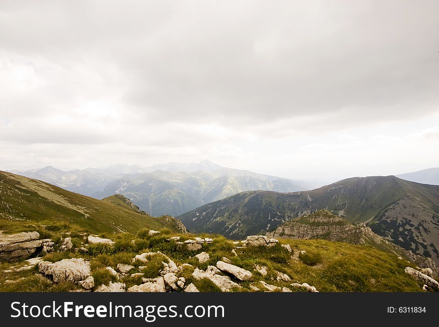 A view of Polish Tatra mountains on an overcast day
